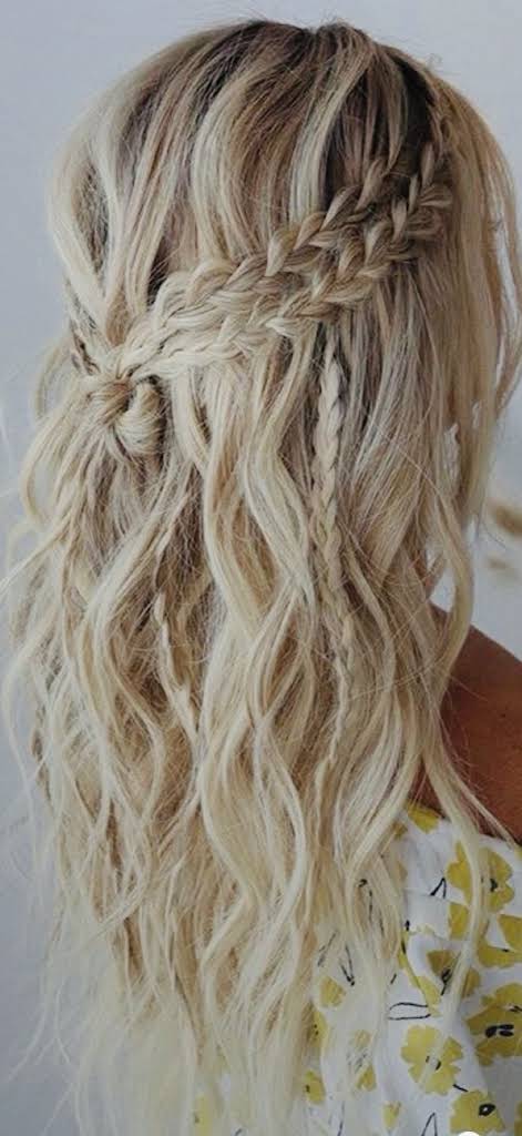 Long, vibrant red-cooper hair with waves in sunlight